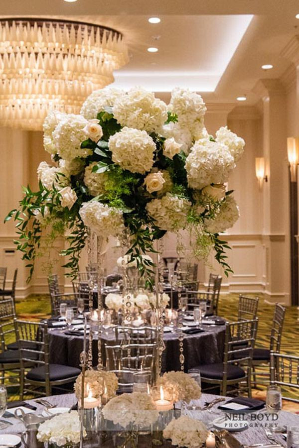 Wedding Flowers Raleigh Nc
 Tall white floral centerpieces Raleigh NC weddings