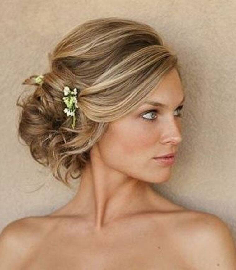 Wedding Hairstyles Side Bun
 From messy hair to loose curls Wedding hairdos for the