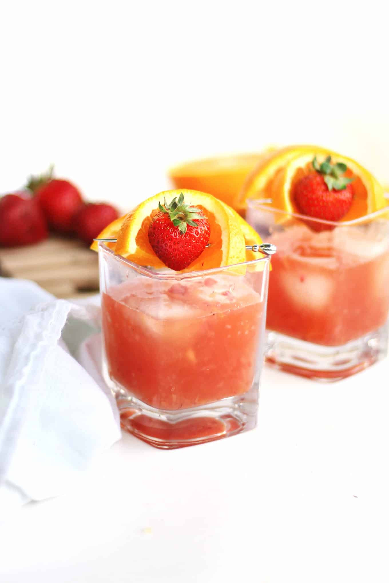 Whiskey Summer Drinks
 Summer bourbon cocktail with strawberry and orange