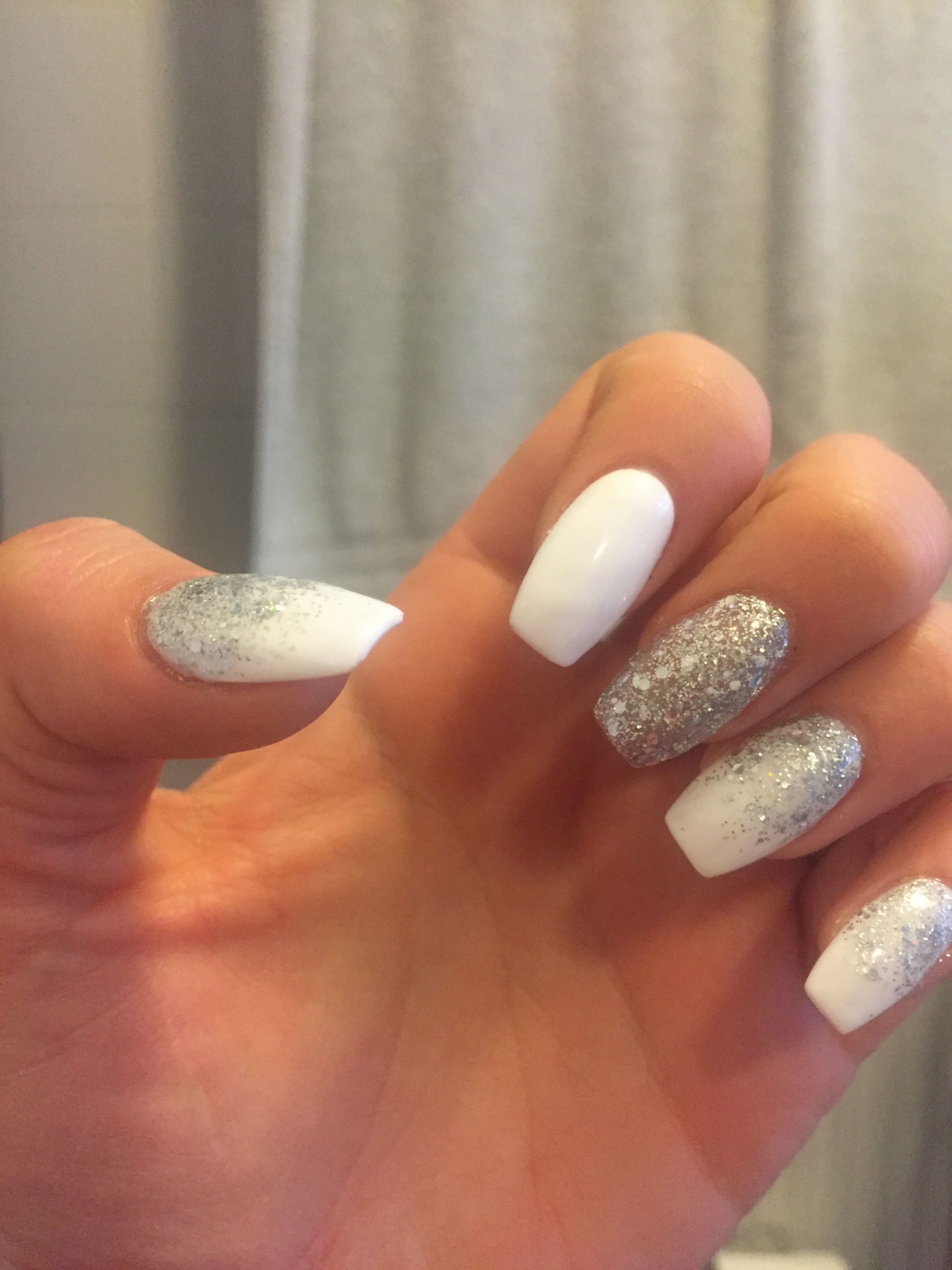 White And Silver Glitter Nails
 3 6 16 white and silver coffin shape nails