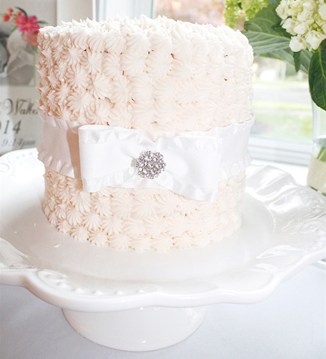 White Baby Shower Cake
 Party Feature Pink Floral Sip n See Celebration