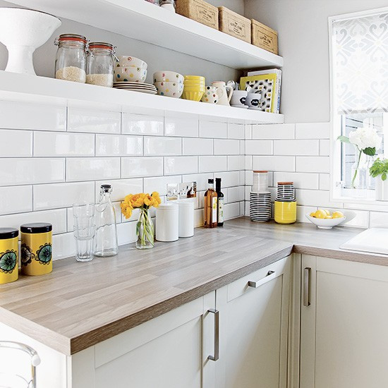 White Tile Kitchen
 White kitchen with metro tiles and open shelves