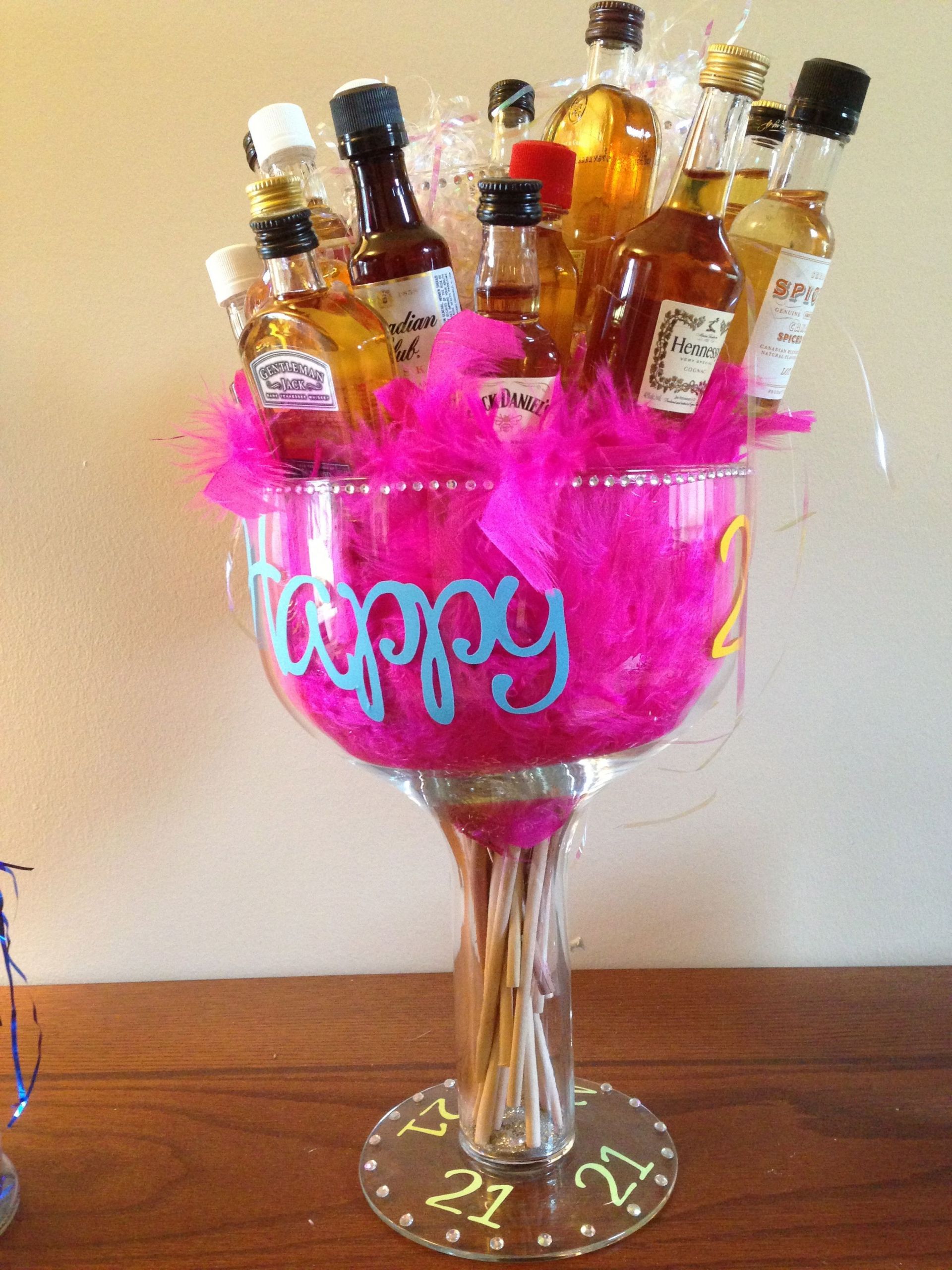 Wine Glass Gift Basket Ideas
 I took a huge wine glass flea market find and added 21st