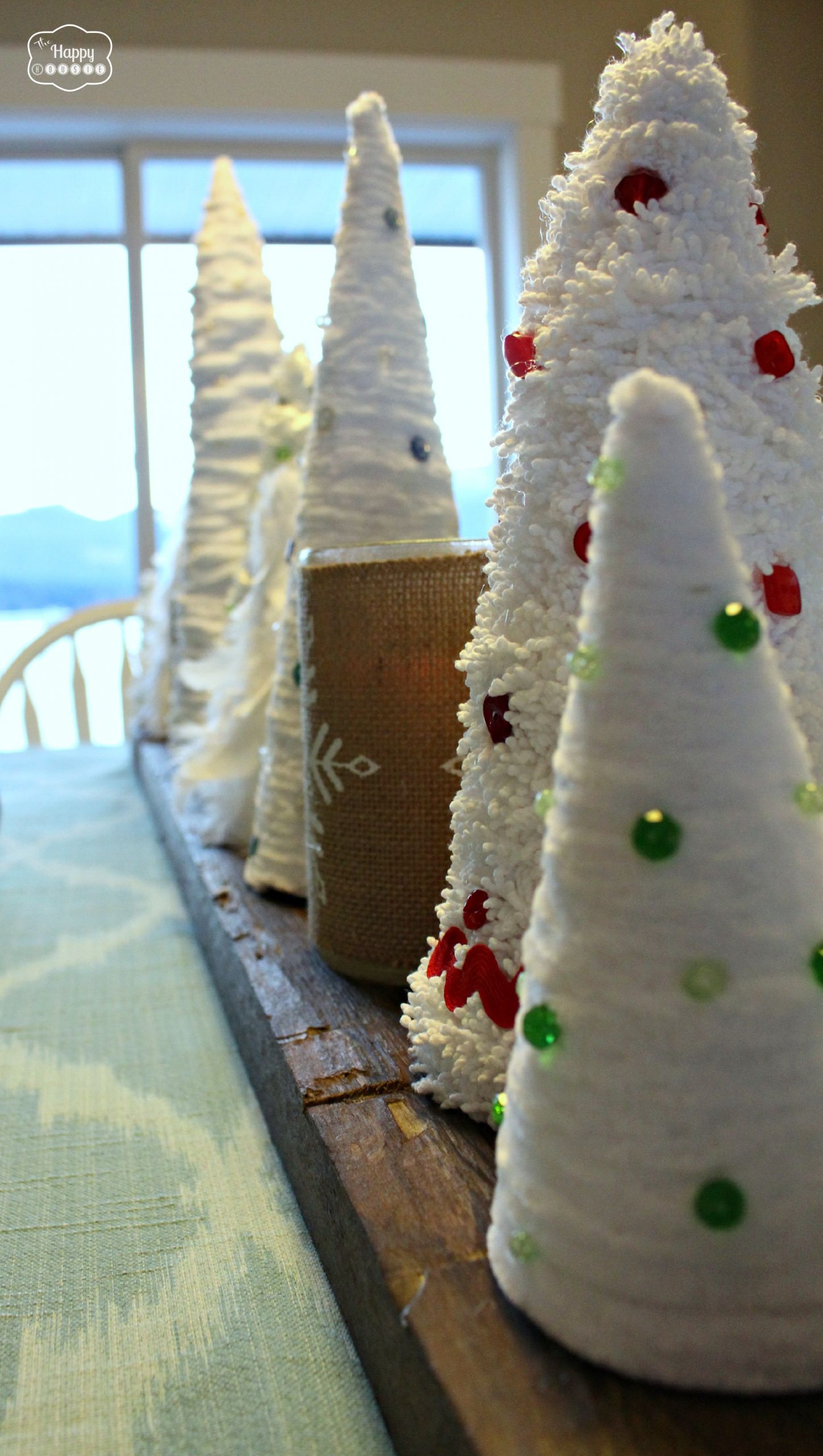 Wood Christmas Tree DIY
 Easy Thrifty DIY Mini Christmas Trees with Yarn and